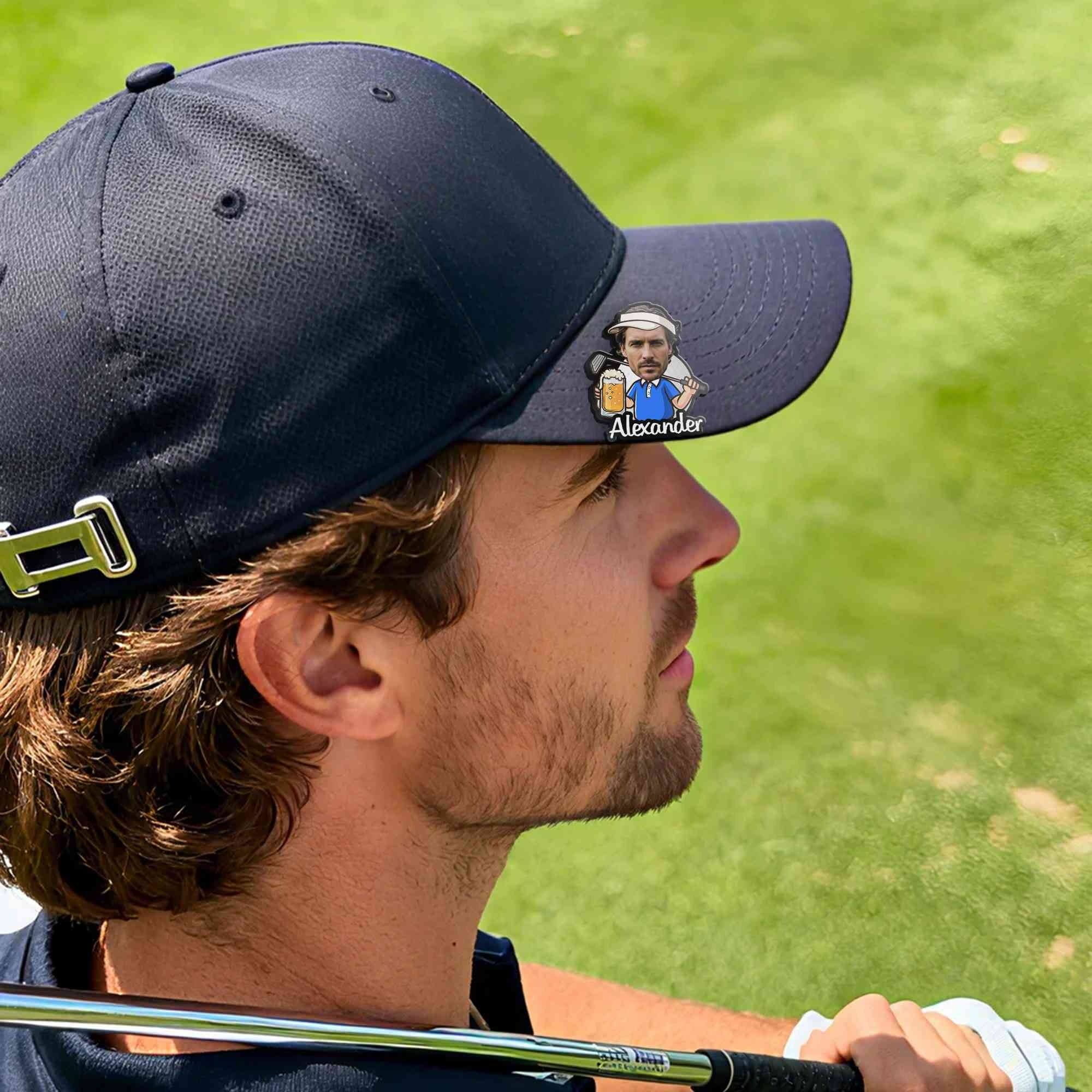 Custom Alexander photo golf ball marker attached to black golf cap