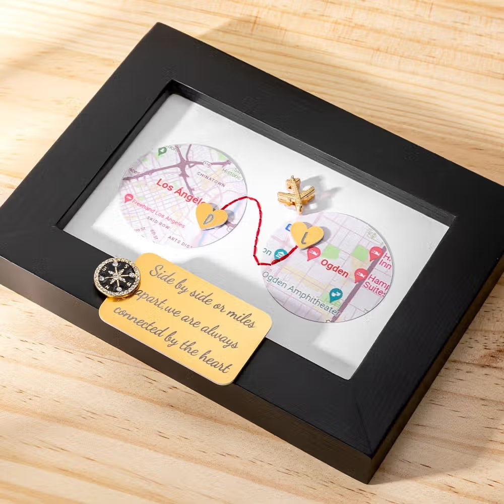 Angled view of personalized two location map gift in a wooden frame