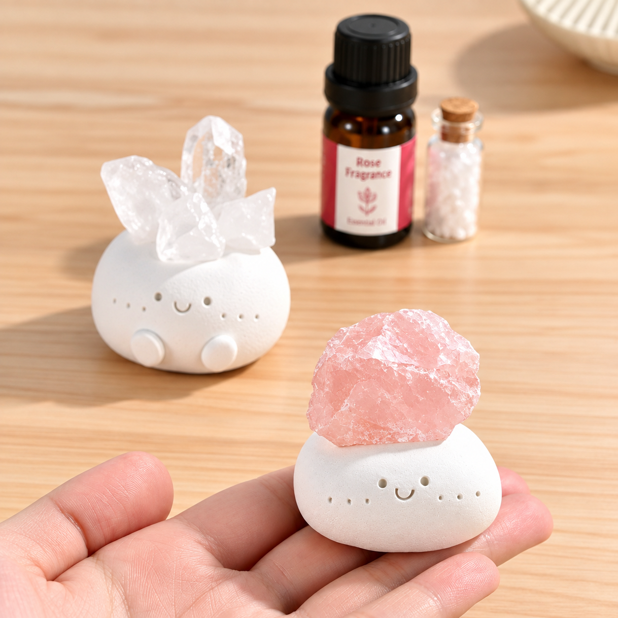 Crystal aromatherapy diffuser with essential oil and pink raw crystal