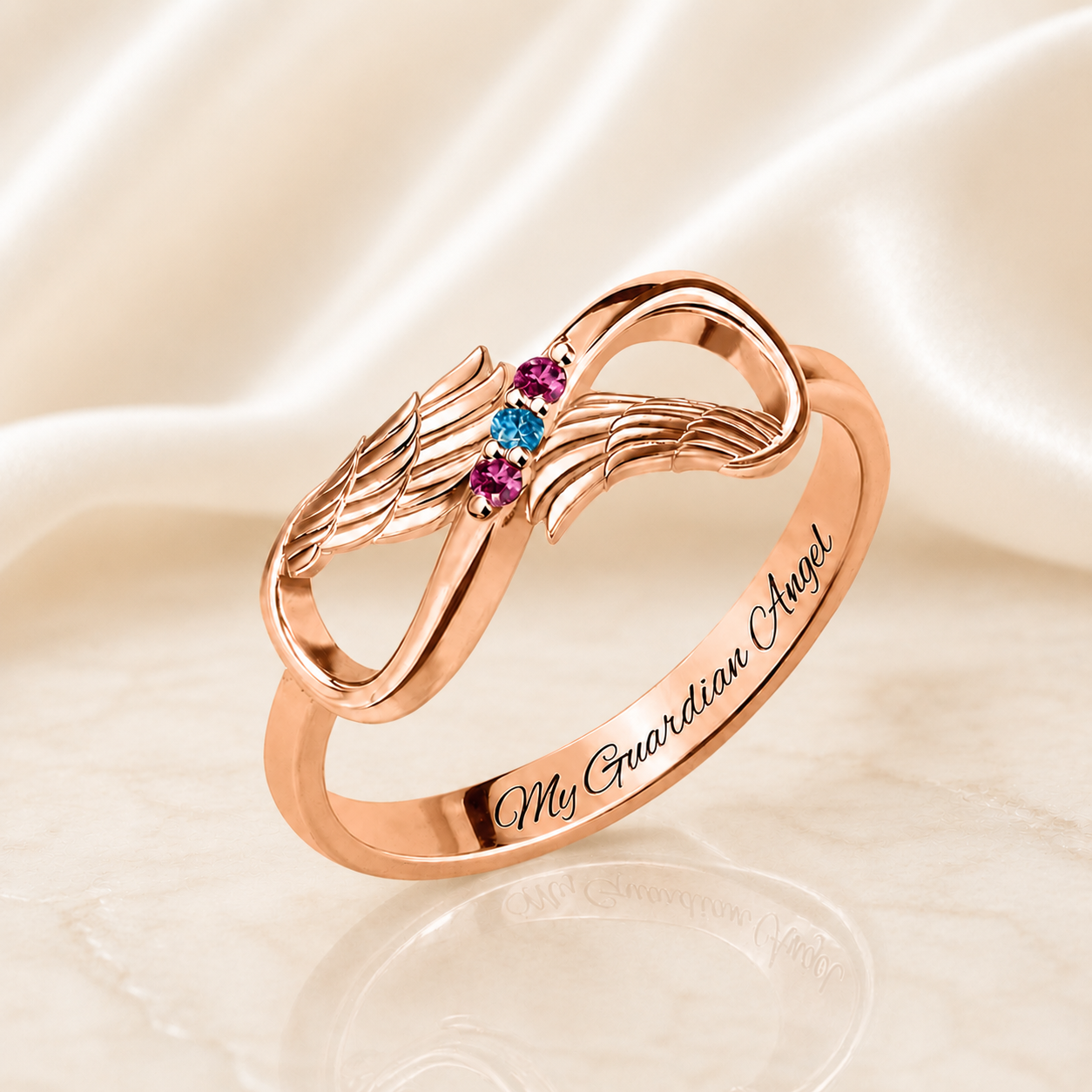 Rose gold angel wings infinity ring with three birthstones