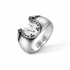 Custom M initial horseshoe ring with LUCKY engraving on a clean white background