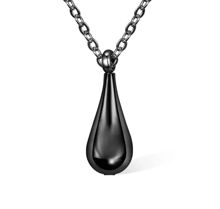 Glossy black teardrop pendant on a chain against a white background