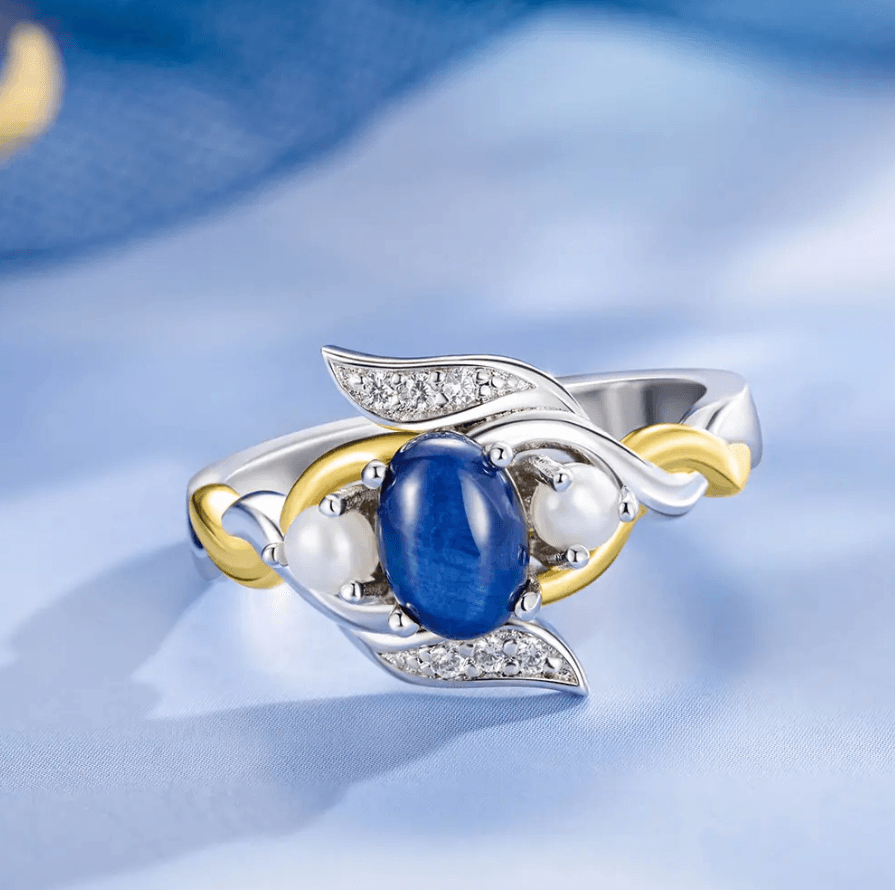 Exquisite Blue Star Sapphire and Pearl Ring with Sterling Silver and 18K Gold Plating, showcasing a unique and intricate design, perfect for special occasions.