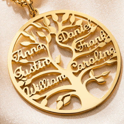 A close-up of a gold circular pendant with a family tree design, displaying names such as Anna, Austin, William, Daniel, Frank, and Caroline.