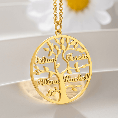 A gold family tree pendant necklace displaying the names Olivia, Jessie, Alina, and Rachel, intricately designed with detailed branches and leaves, hanging on a delicate chain.