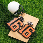 Custom football number 16 earrings in orange and black