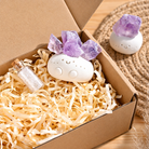 Purple crystal diffuser smiley pot presented in gift box