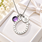 Personalized horseshoe good luck necklace with initial and birthstone charm