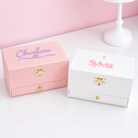 Pink and white personalized name jewelry boxes for girls with gold hardware and drawers