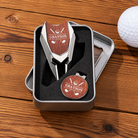 Personalized Grayson monogram golf divot tool and ball marker set on wooden background