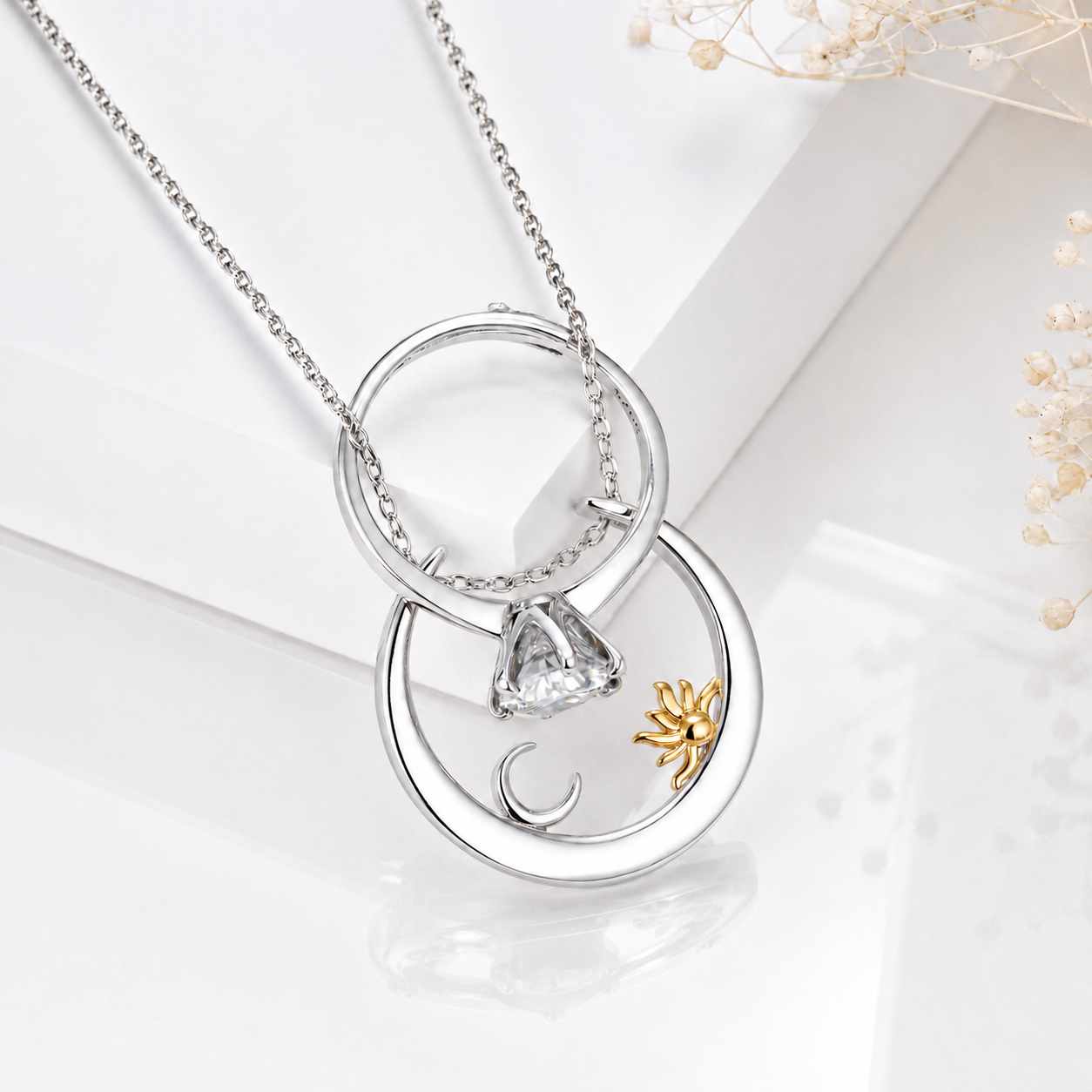 Silver sun and moon ring holder necklace with celestial charm design