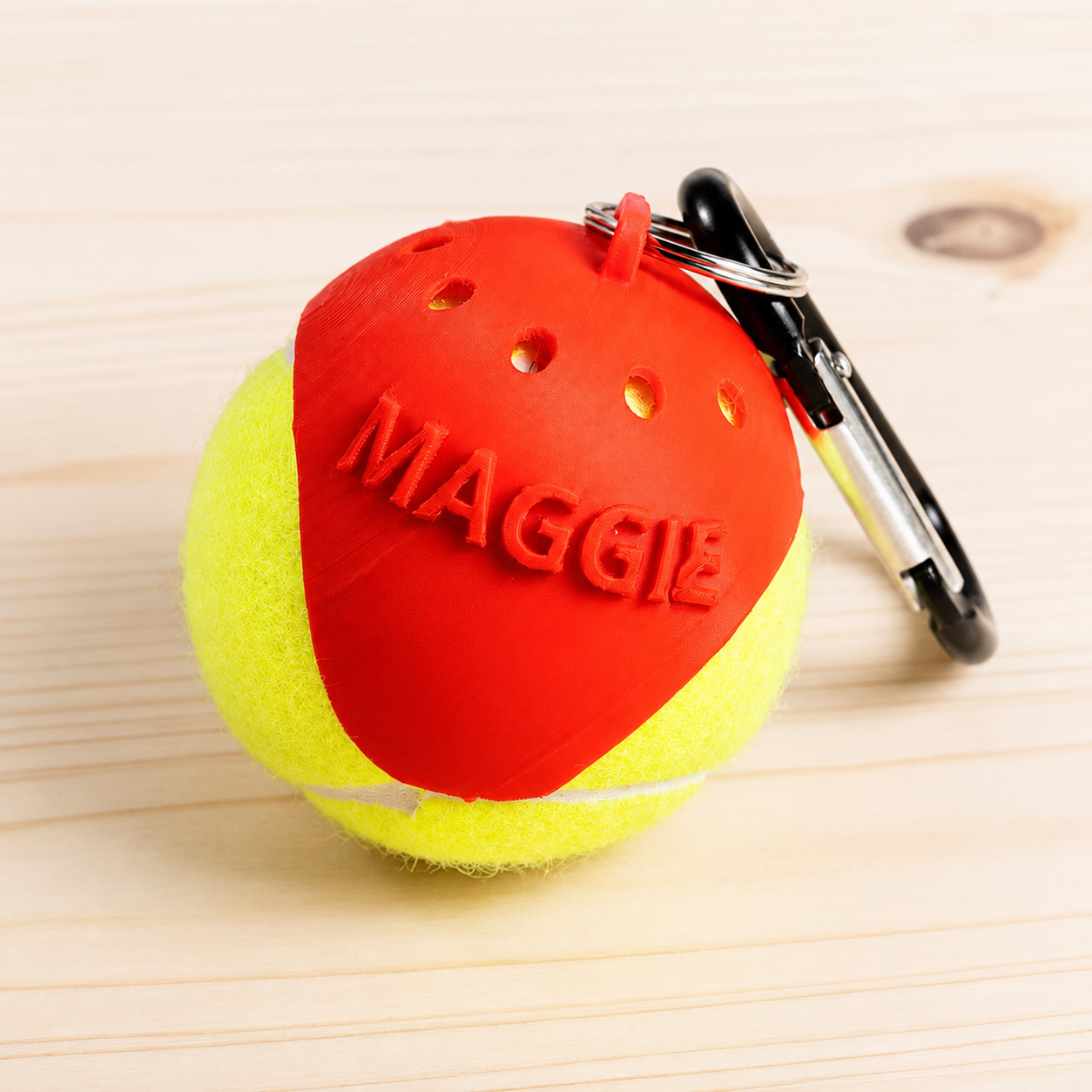 Personalized red dog tennis ball holder with carabiner and custom name