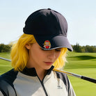 Personalized Valentina cartoon golf ball marker attached to black golf hat