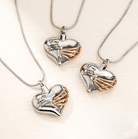 Three heart-shaped pendants with the inscription "A piece of my heart lives in heaven," each featuring a gold ribbon design, on silver chains, displayed on a light surface.