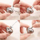 Step-by-step process of filling a heart-shaped pendant with ashes, showing hands using a funnel and pin tool, and threading the pendant onto a silver chain.