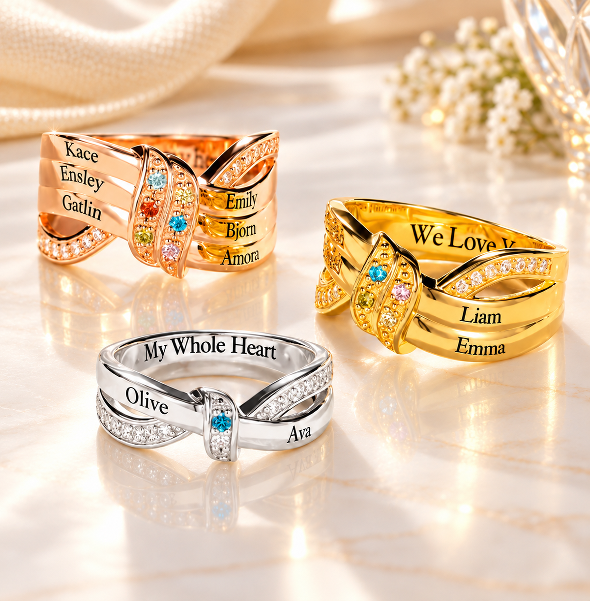 Personalized family birthstone and name rings in rose gold, gold and silver, featuring engraved children's names and colourful birthstones.