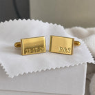 Personalized gold rectangle cufflinks engraved with initials and date