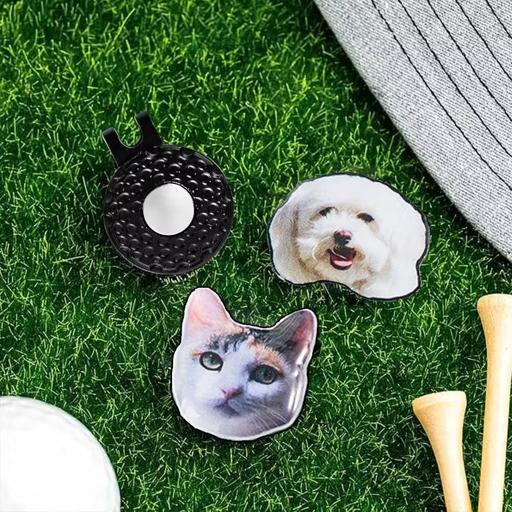 Personalized pet photo golf ball markers featuring dog and cat pictures on golf grass