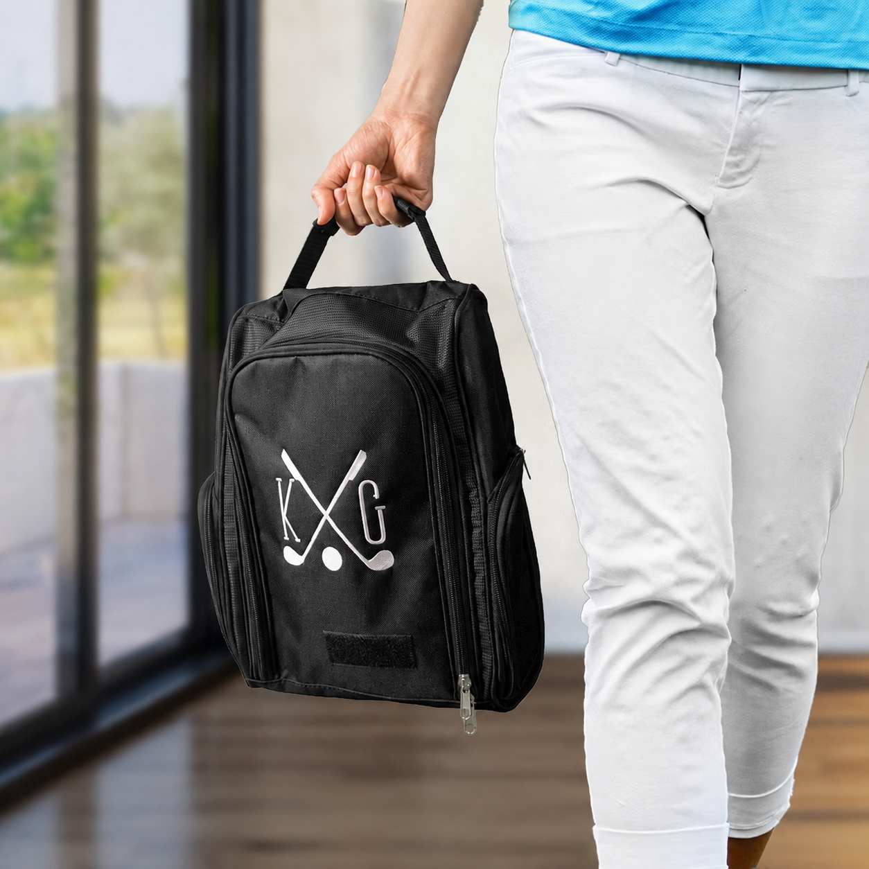 Personalized black golf shoe bag with white crossed golf clubs embroidery