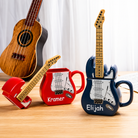 Blue and red personalised guitar-shaped ceramic coffee mugs with removable guitar-shaped lids