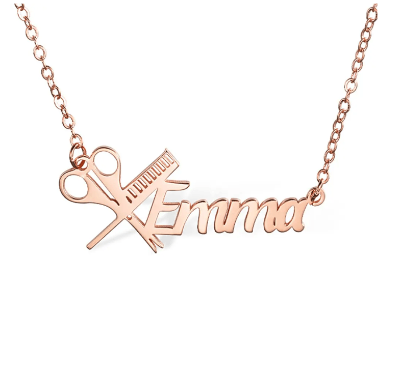 Rose gold personalized hairdresser necklace with the name Emma, featuring a scissors and comb design, displayed on a white background.