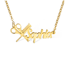 Gold personalized hairdresser necklace with the name Sophia, featuring a scissors and comb design, displayed on a white background.