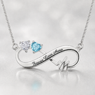 Heartbeat infinity necklace with clear and aquamarine blue birthstones