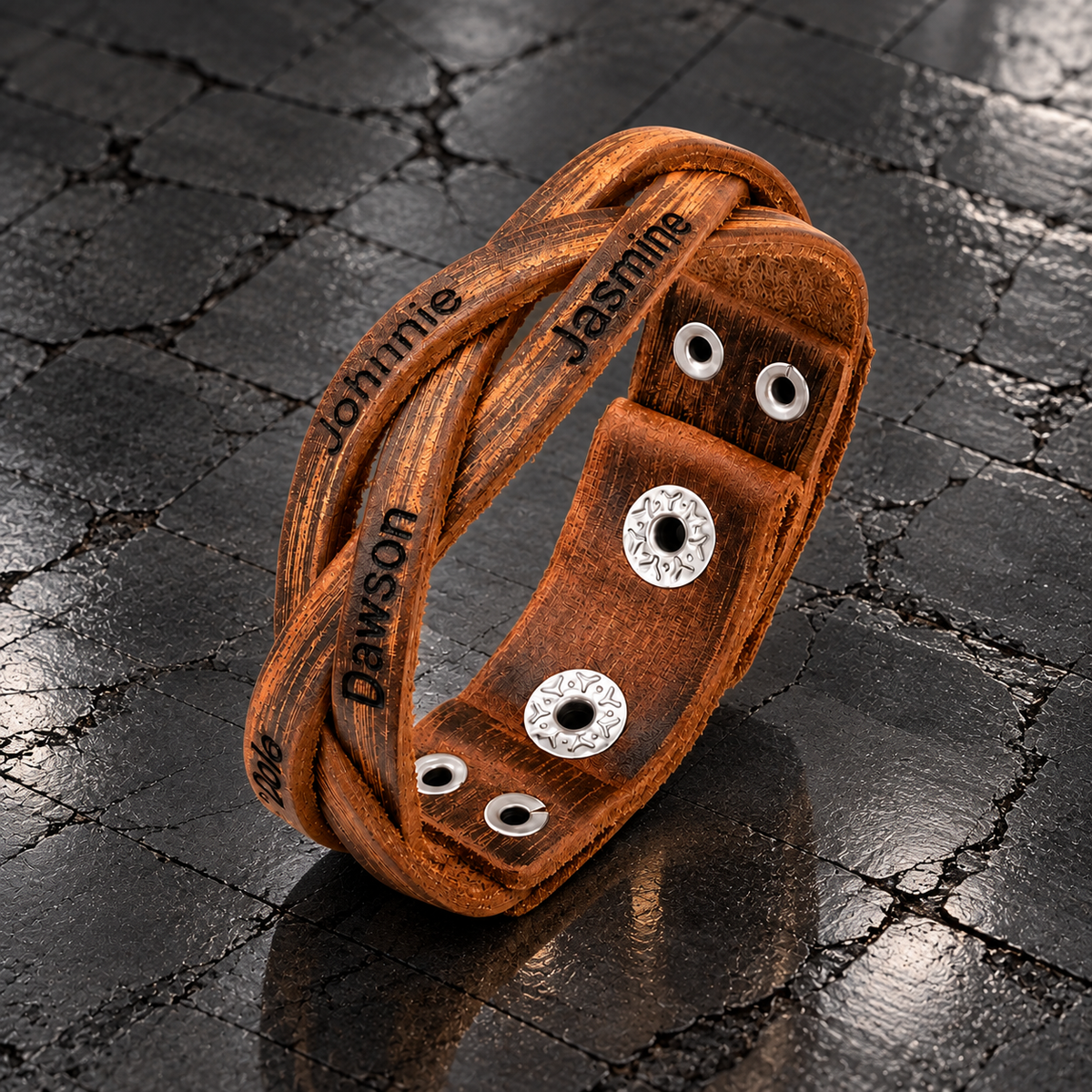 Personalized leather bracelet with custom names and adjustable snap closure