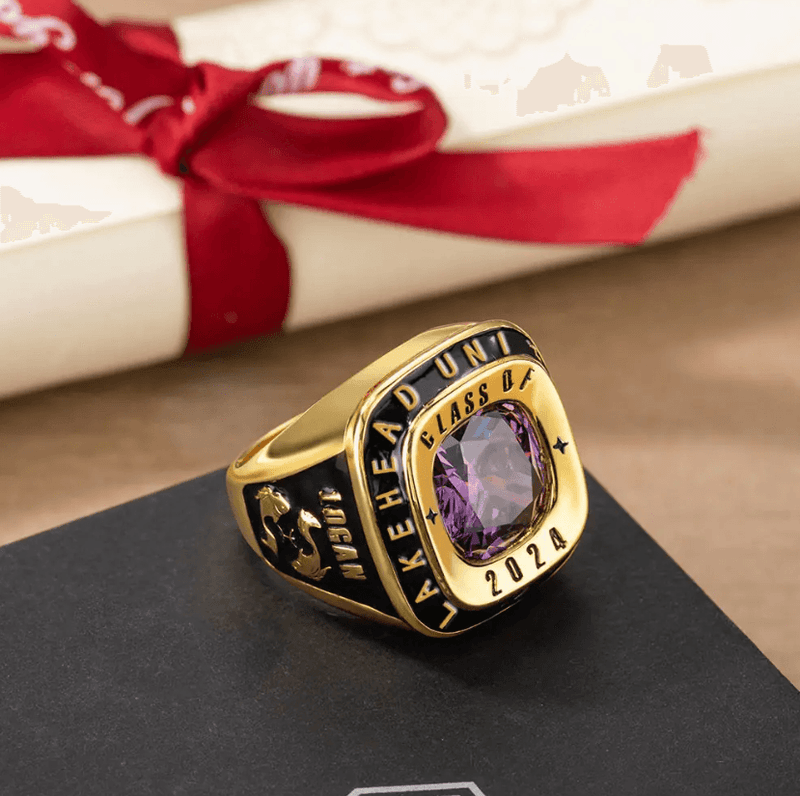 A close-up of a year class ring, featuring intricate engravings and a gemstone centerpiece, symbolizing academic achievement and pride.