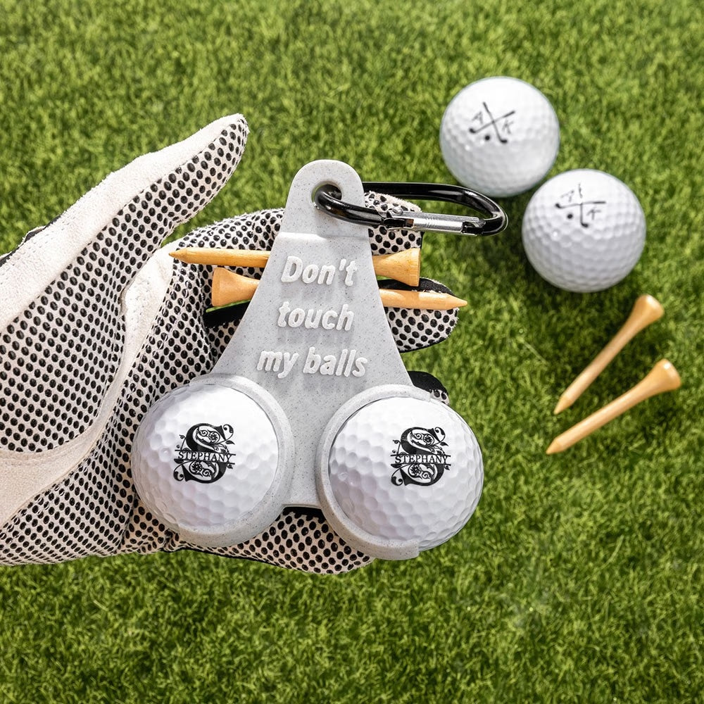 Grey personalized golf ball holder with two golf balls glove and wooden tees