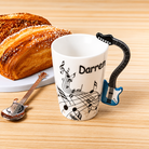 Personalised guitar handle ceramic coffee mug with custom name and blue guitar-shaped handle
