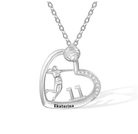 A silver heart-shaped volleyball-themed necklace featuring a player, the number 11, and the name Ekaterina, with a diamond-accented curve.