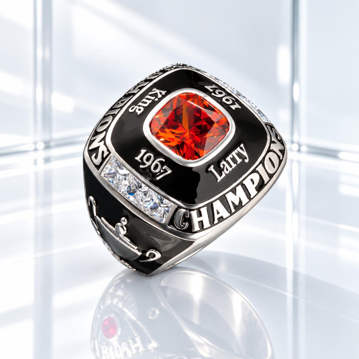 Personalized World Champion ring with custom engraving, red center stone, black enamel, and silver championship-style detailing.