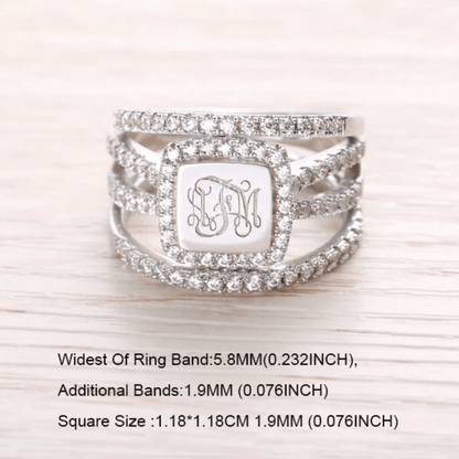 A square-shaped, monogrammed sterling silver stackable ring with "AFM" initials, framed by cubic zirconias, and dimensions of band width and square size provided.