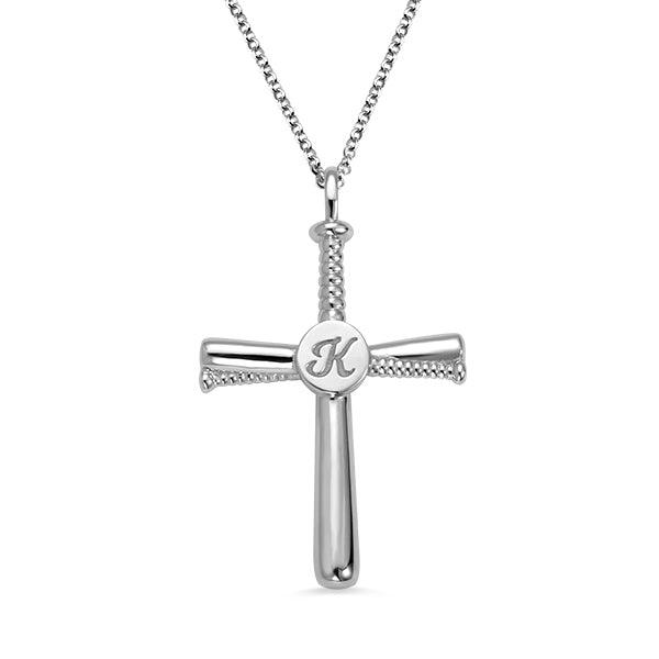 A silver cross pendant necklace with a textured design, featuring a round center with an engraved letter "K."