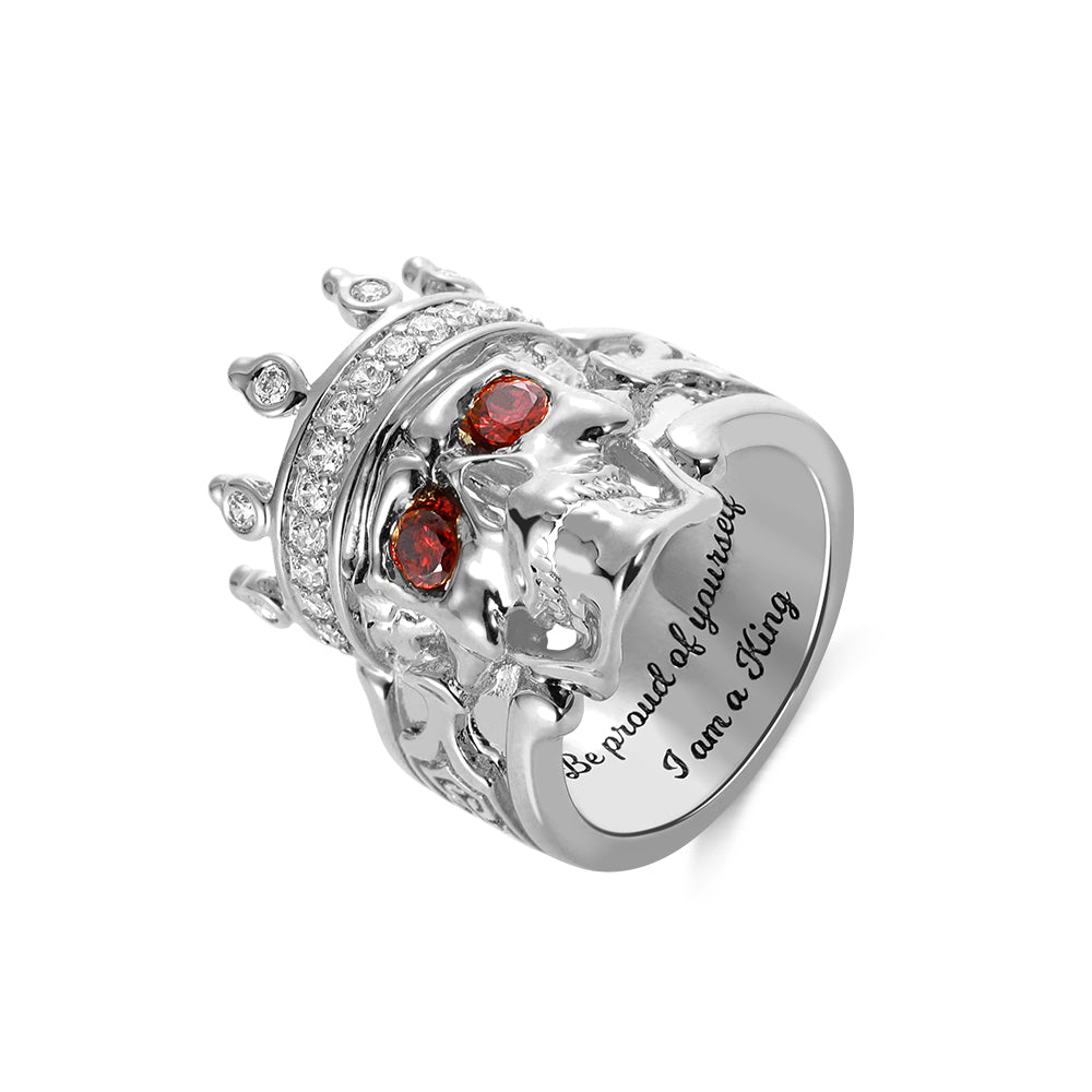 Silver gothic skeleton king ring with crown, red birthstone eyes, and engraved motivational quote.
