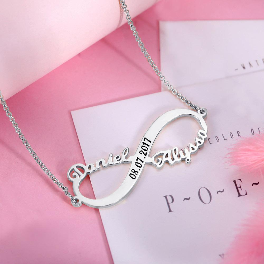 Sterling Silver Personalized Infinity Necklace with the names Daniel and Alyssa and custom date engraving 08.07.2017, displayed on a pink background.