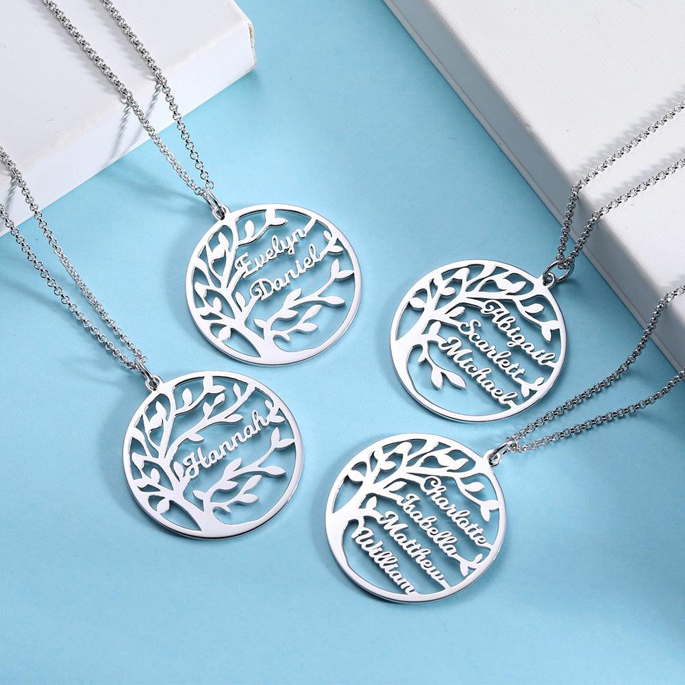 Four silver necklaces with round pendants, each featuring a tree design and names such as Evelyn, Daniel, Abigail, Scarlett, Michael, Charlotte, Isabella, Matthew, William, and Hannah.