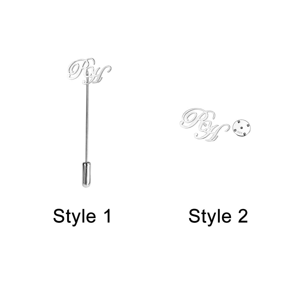 Two styles of 'RH' script lapel pin in Style 1 with a long pin and Style 2 with a butterfly clutch.
