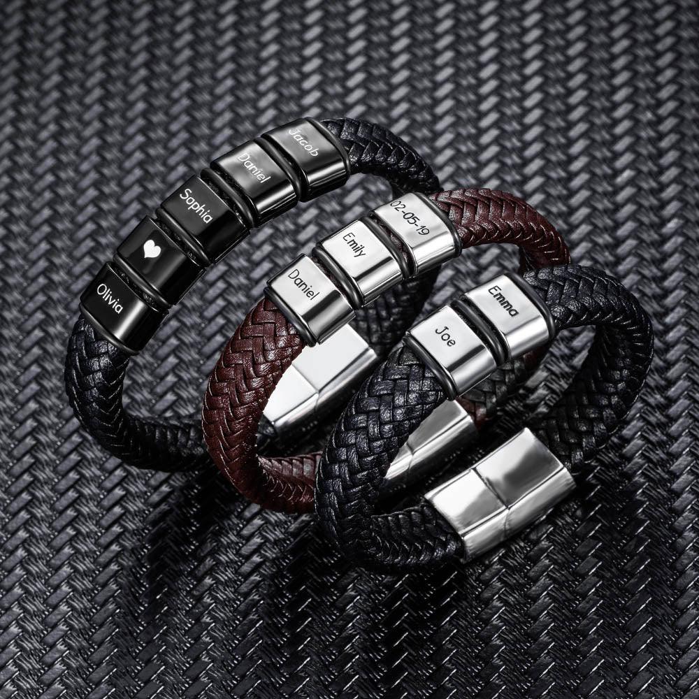 Three intertwined leather bracelets with personalized stainless steel beads, displayed on a textured surface.