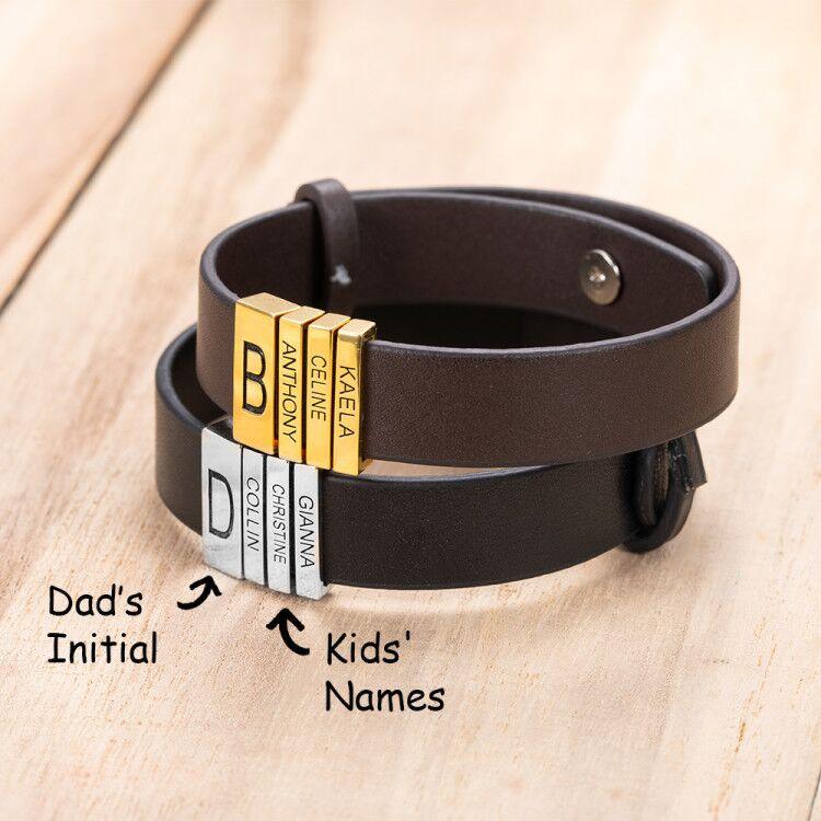 Leather bracelet with customizable gold and silver beads featuring names 'Kaela', 'Celine', 'Anthony', and initial 'B' on a wooden surface.