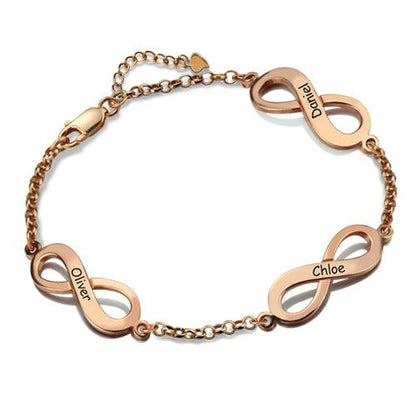 A rose gold bracelet with three infinity symbols, each engraved with a name: "Oliver," "Chloe," and "Daniel." The bracelet features a chain link design and a clasp.