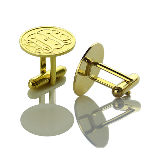 Gold-toned cufflinks with "ABC" monogram and 925 sterling silver stamp visible underneath.