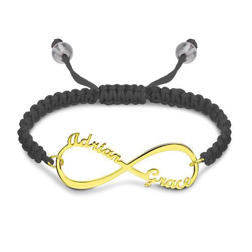 Gold infinity symbol bracelet with "Addison" and "Grace" engraved, on a black macrame band.