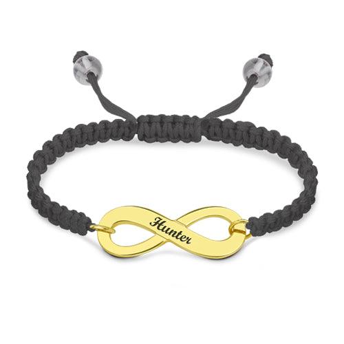 Customizable gold infinity symbol bracelet with 'Hunter' engraved, featuring a black braided band and adjustable closure.