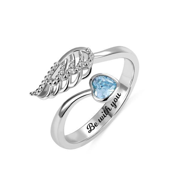 Silver angel wing ring with a heart-shaped blue gemstone and 'Be with you' engraving BD37-1 - 600 x 600px