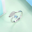 Silver ring with angel wing design, blue heart gemstone, and 'Be with you' inscription BD37-2 - 600 x 600px