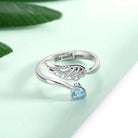 Delicate silver angel wing ring with a blue teardrop gem and 'Be with you' engraving BD37-3 - 600 x 600px