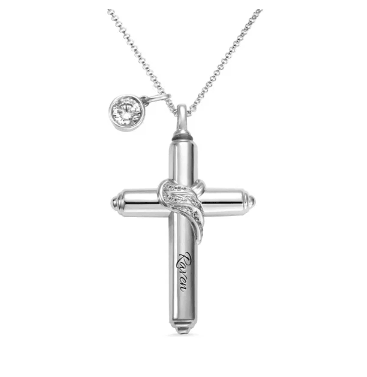 Silver cremation cross necklace with a diamond-studded infinity symbol wrap and an accompanying circular pendant