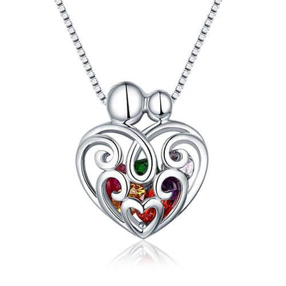Silver heart-shaped pendant with swirl patterns and multicolored gemstones on a chain.